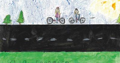 Kuvassa lapsen piirros pyöräilijöistä